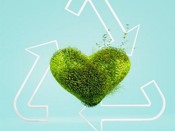 Herz aus Gras, umgeben von Kreislaufwirtschaft-Symbolen auf blauem Hintergrund.