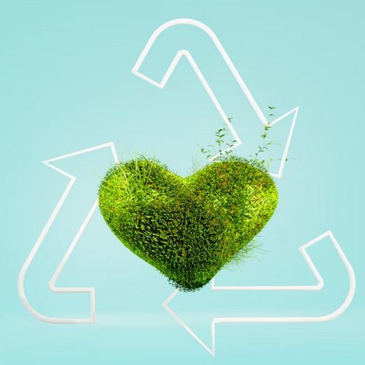 Herz aus Gras, umgeben von Kreislaufwirtschaft-Symbolen auf blauem Hintergrund.